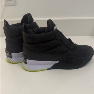 SOREL Black and White High-Top sneaker/boots with Neon Accents